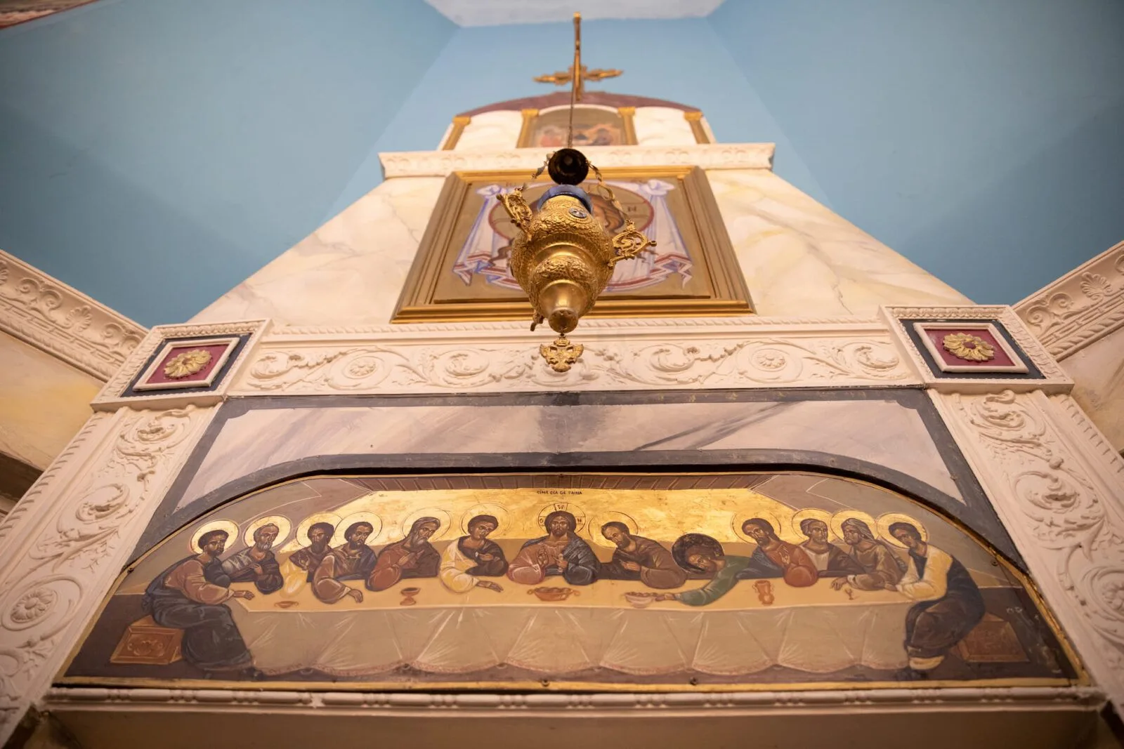 Affresco dell’Ultima Cena sopra una porta
